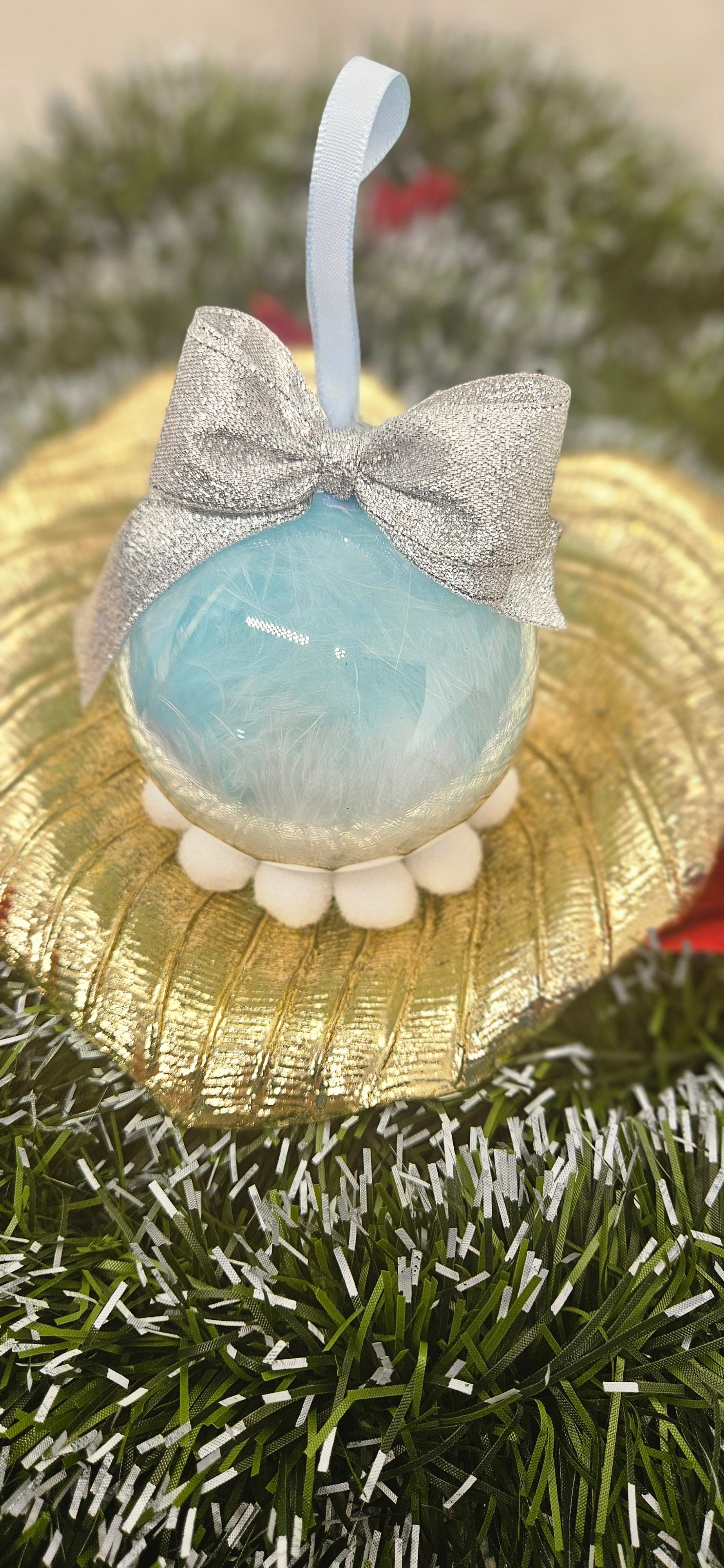 Boule plume bleu ciel