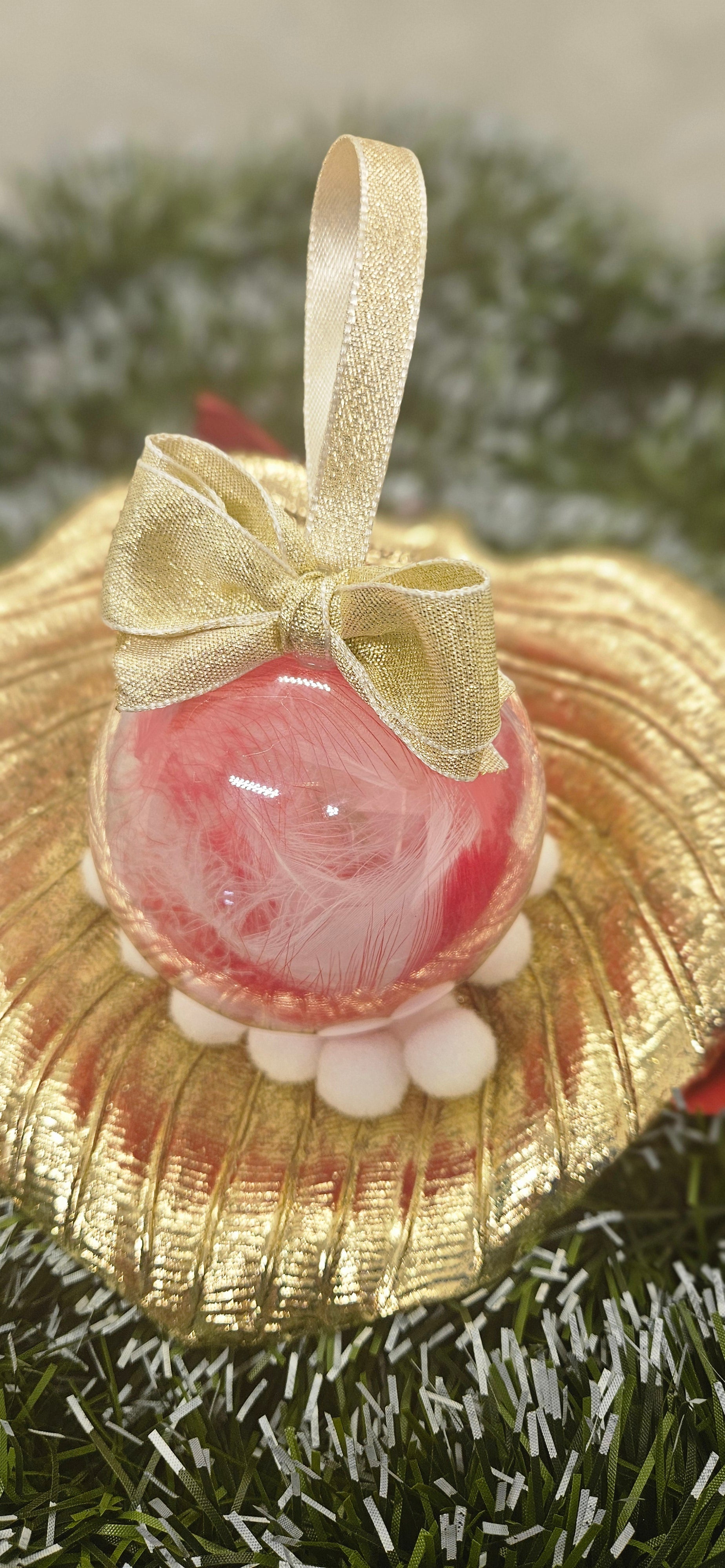 Boule plume rouge