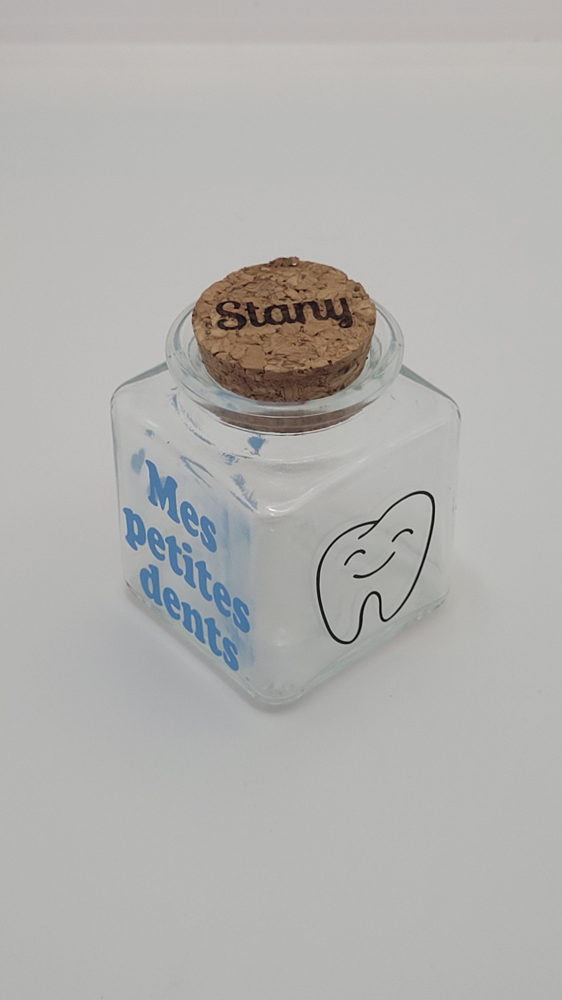 Pot à dent de lait