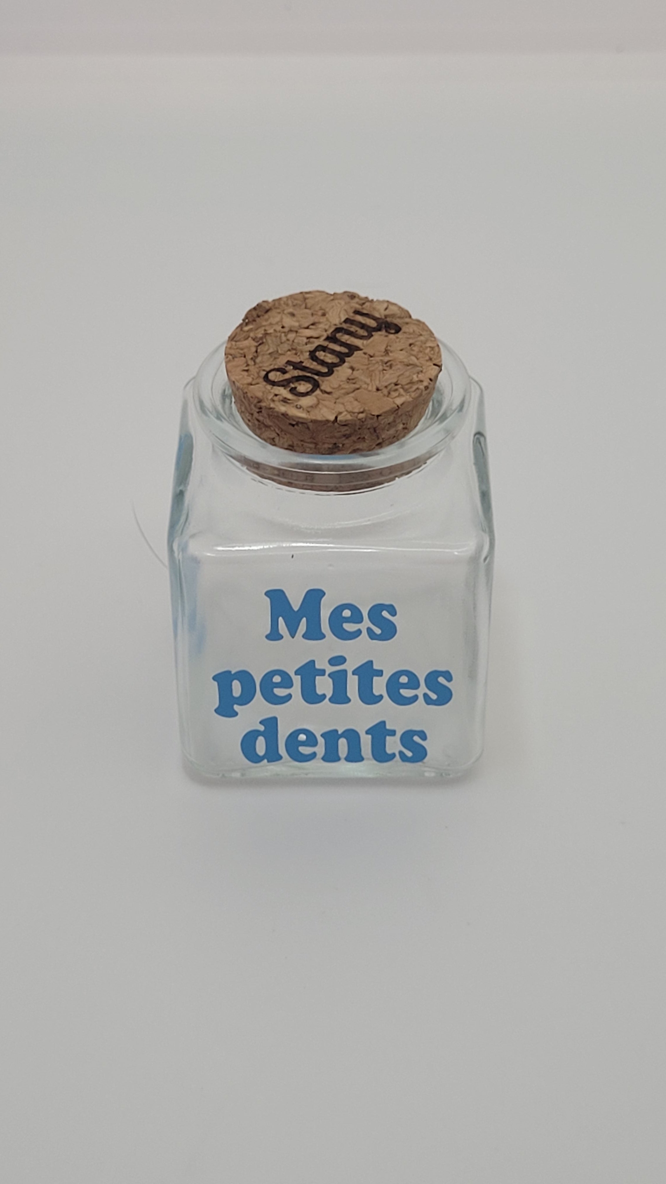 Pot à dent de lait