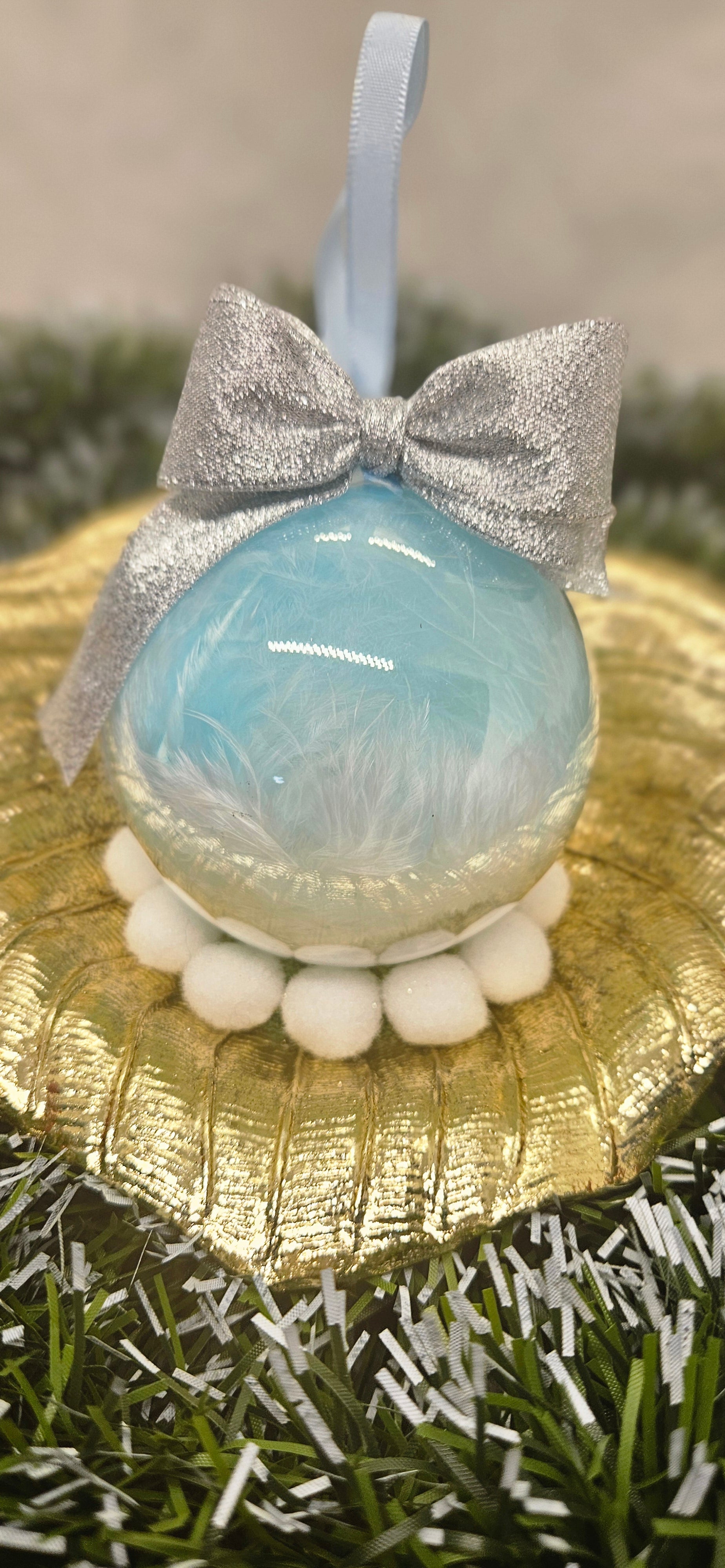 Boule plume bleu ciel