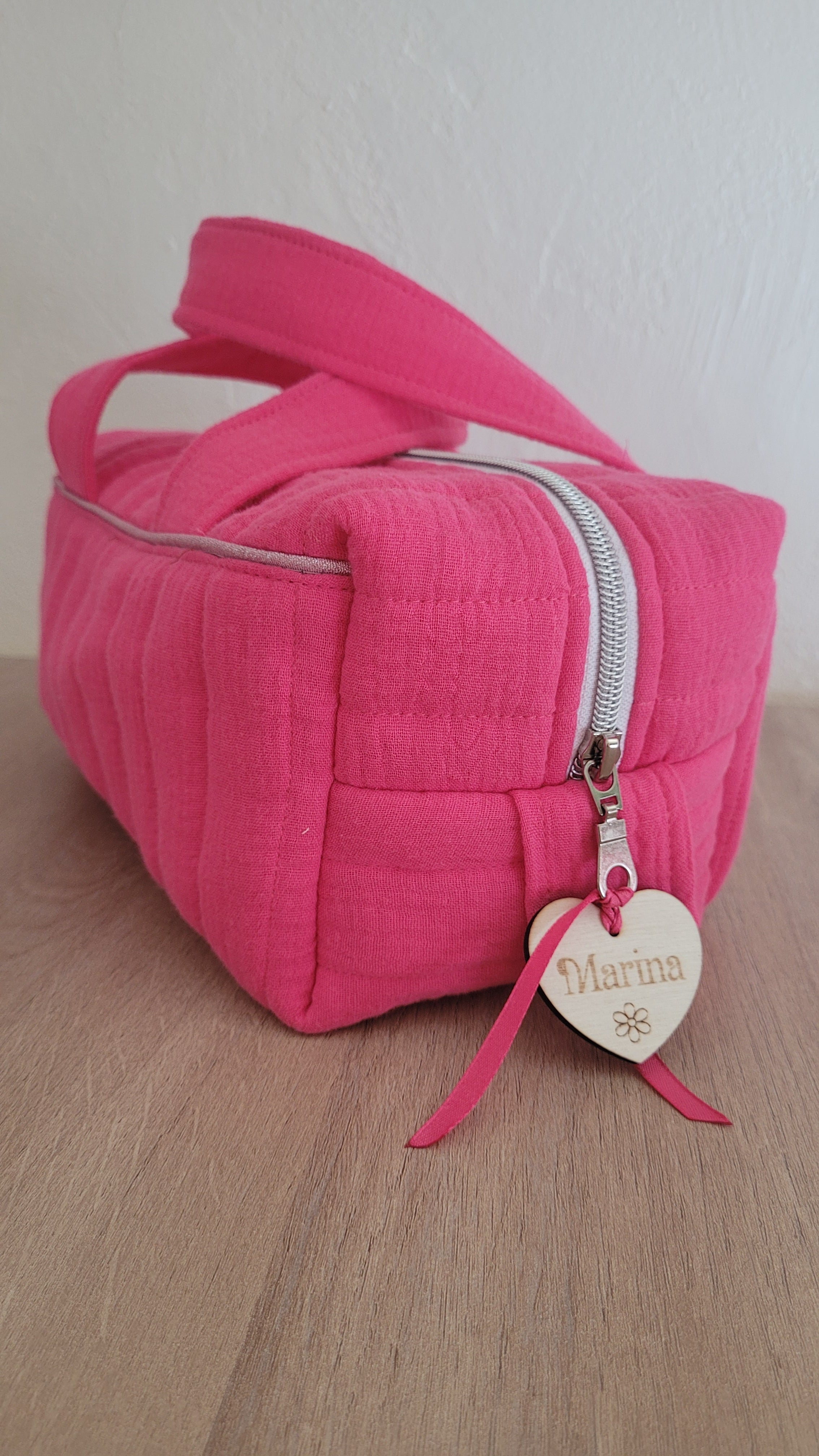 Trousse matelassé avec anse