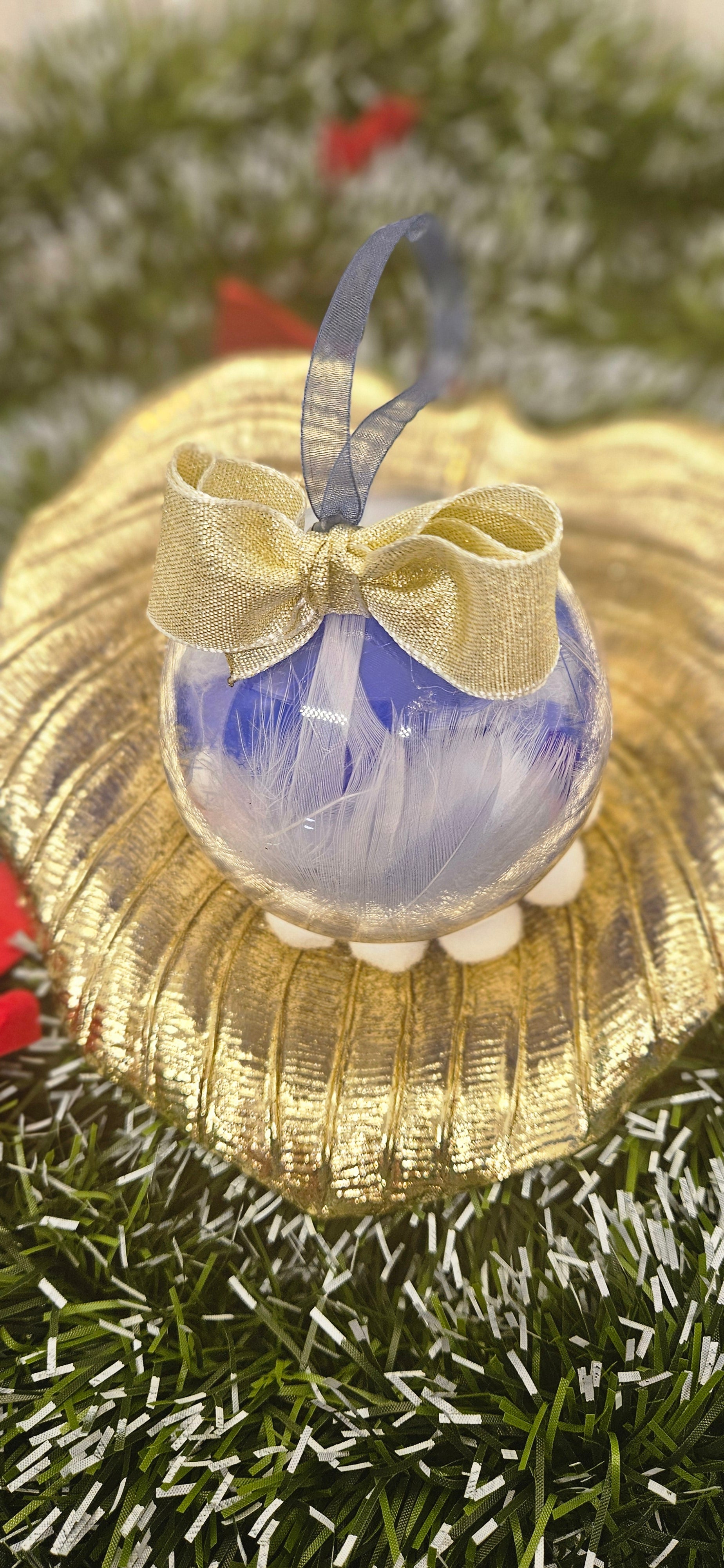 Boule plume bleu
